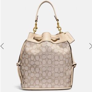 Field Bucket Bag In Signature Jacquard
Stone Ivory